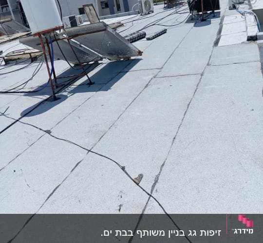 גג אטום עם יריעות ביטומניות ואביזרי חימום